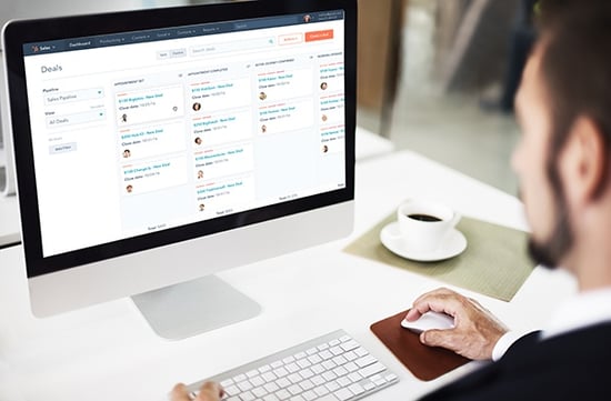 Business man viewing HubSpot CRM