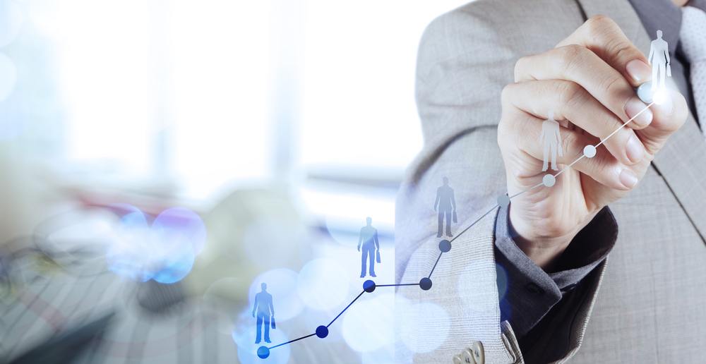 Double exposure of businessman hand choosing people icon as human resources concept-1